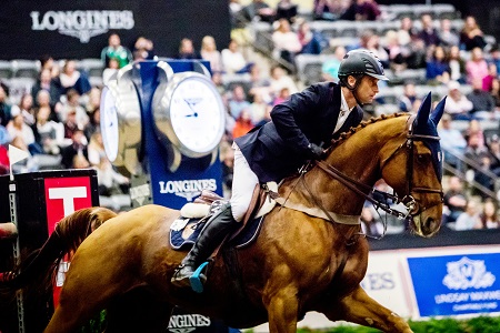 Denis Lynch and Echo RMF winners at the Longines FEI World Cup Jumping in Lexington credits Fei Ashley Neuhof