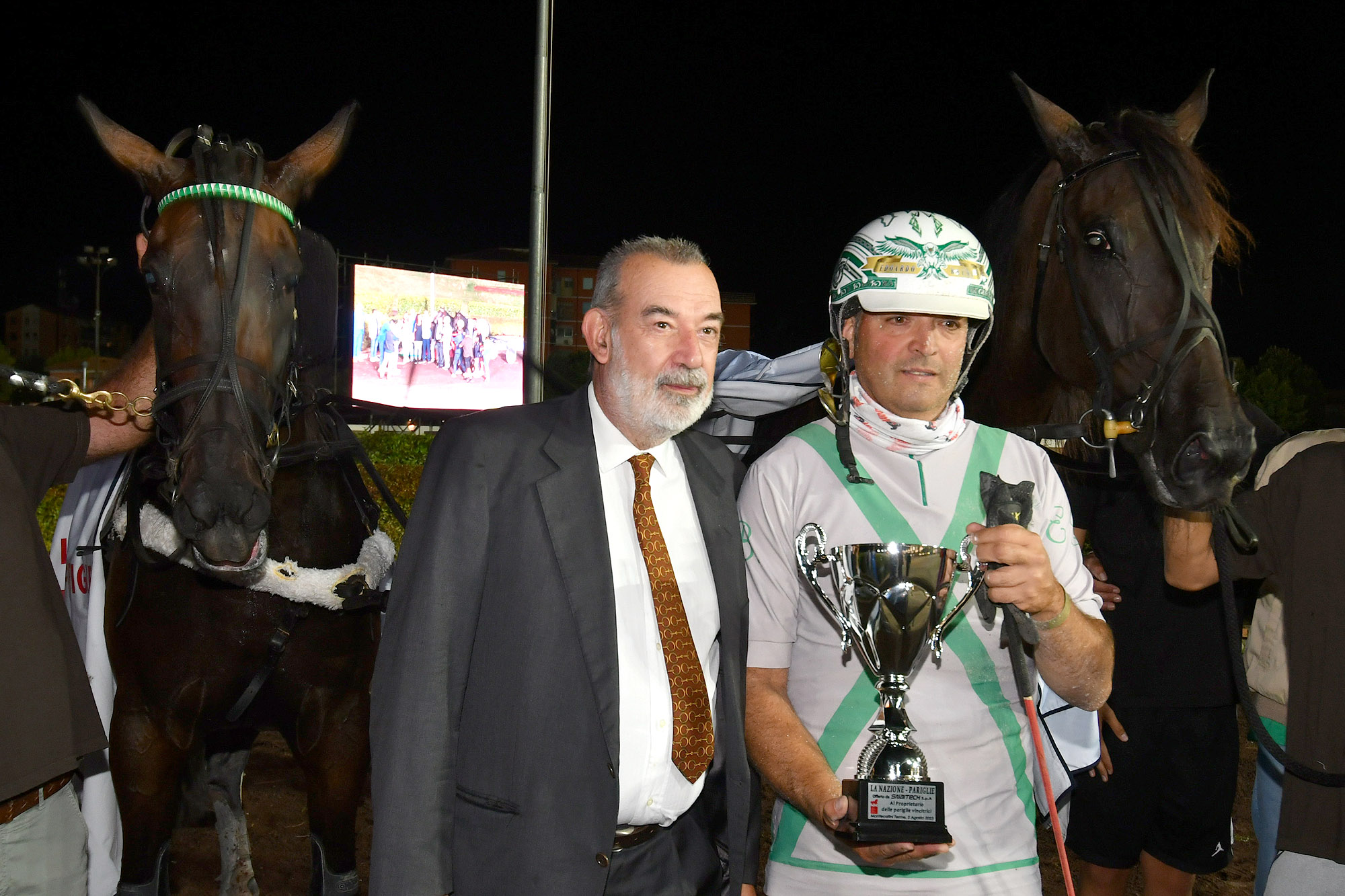 CORSA5 PREMIO QN LA NAZIONE PARIGLIE PREMIAZIONE G. GALLIGANI DE LA NAZIONE A SX CON IL DRIVER R. PEZZATINI