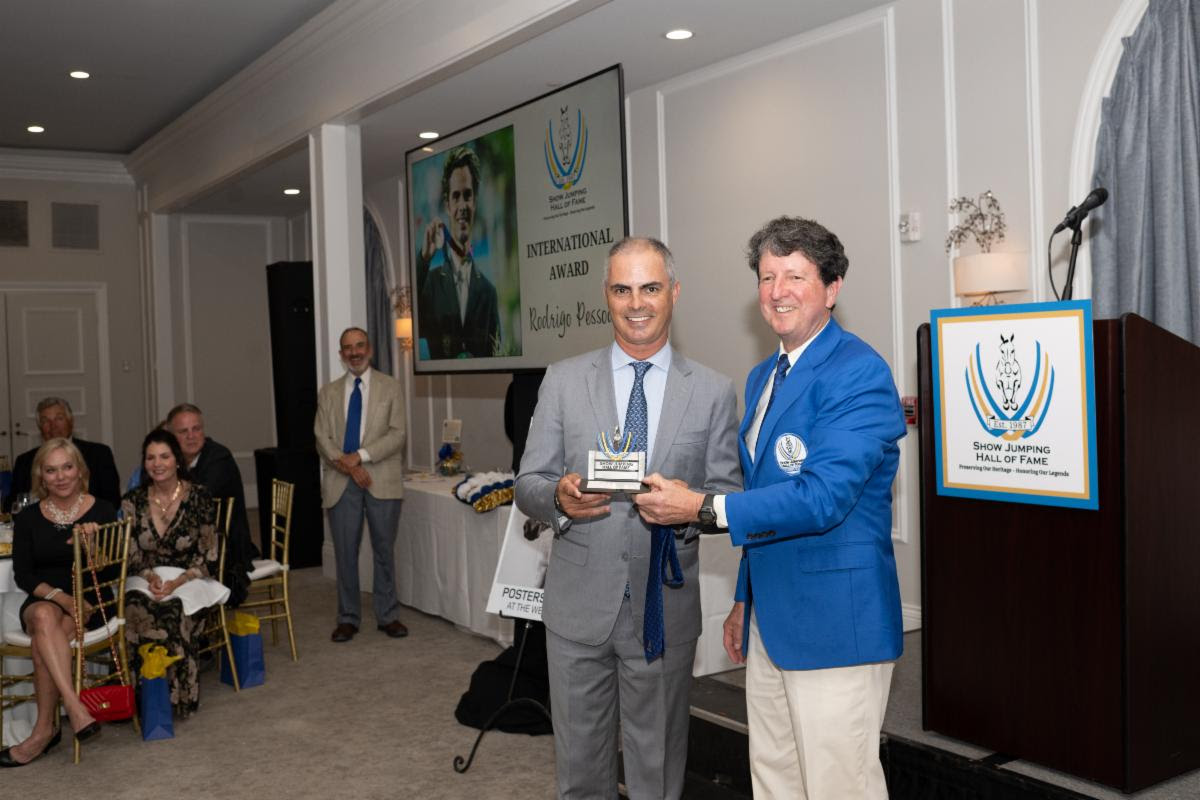 Rodrigo Pessoa Honored with Hall’s International Award at Induction Gala in Wellington 1 Rodrigo Pessoa accepting his award from Hall of Fame Chairman Peter Doubleday