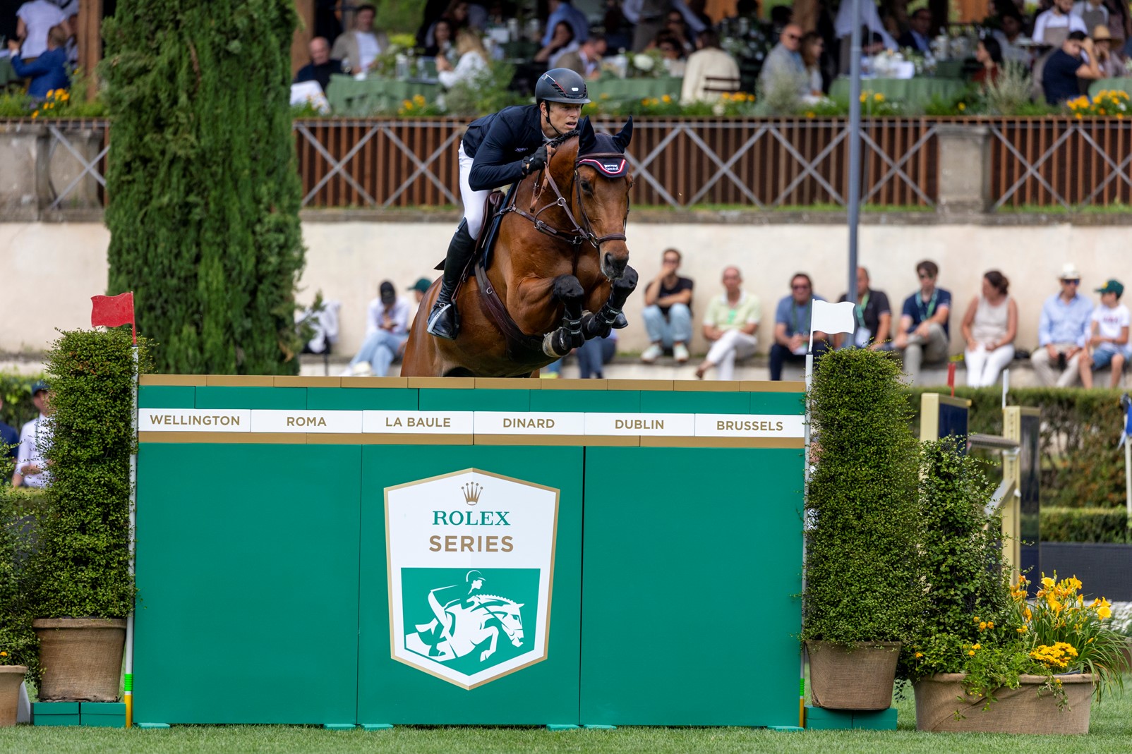 Max Kühner & Elektic Blue during the Rolex Rome Grand Prix .