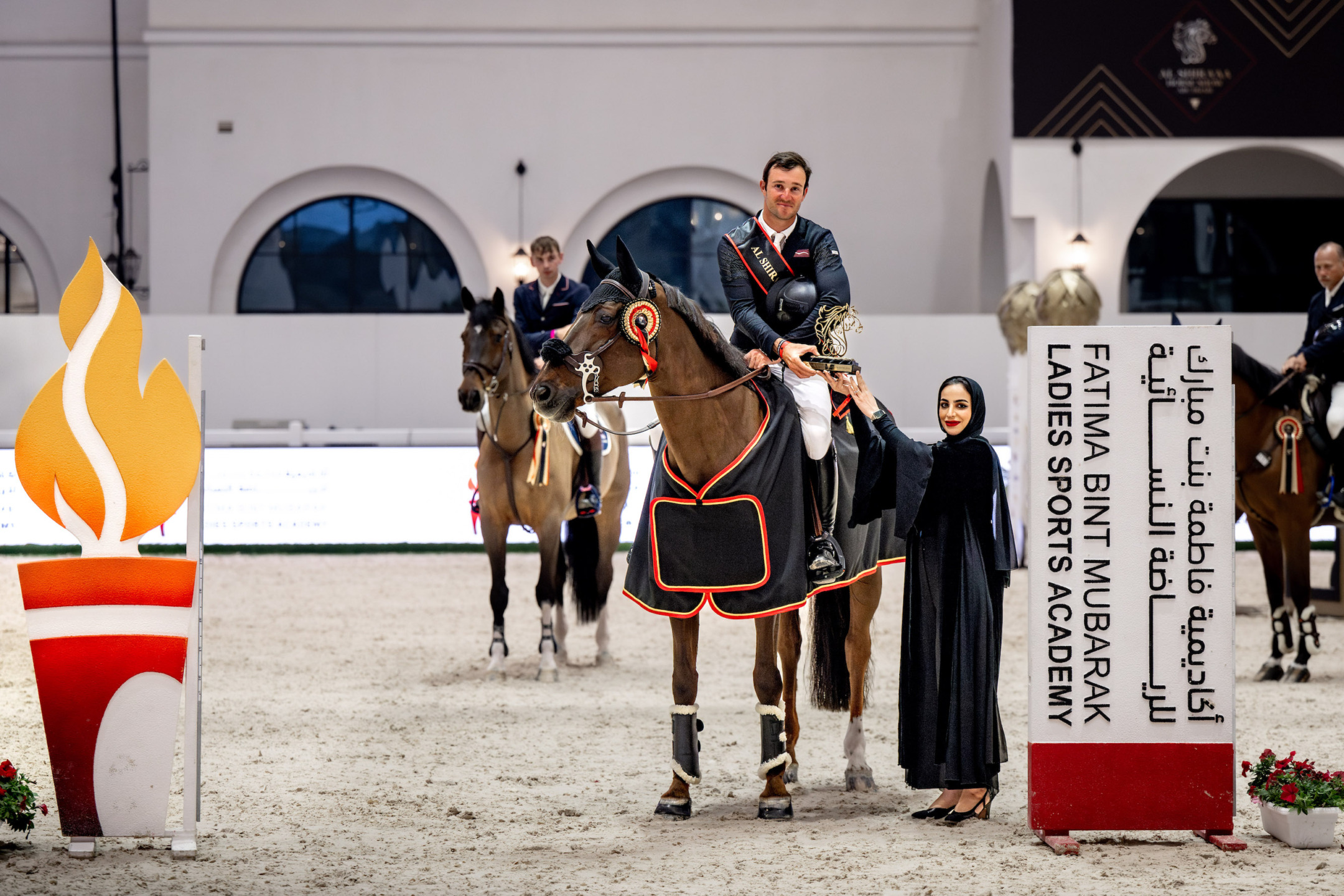 Al Shira’aa Horse Show off to a Flying Start at Abu Dhabi Equestrian Club 1 Constant van Paesschen, winner of the FMBA CSI3* 1.45cm and Ms Shamsa Saif Alhanaee, Board Member of FBMA.