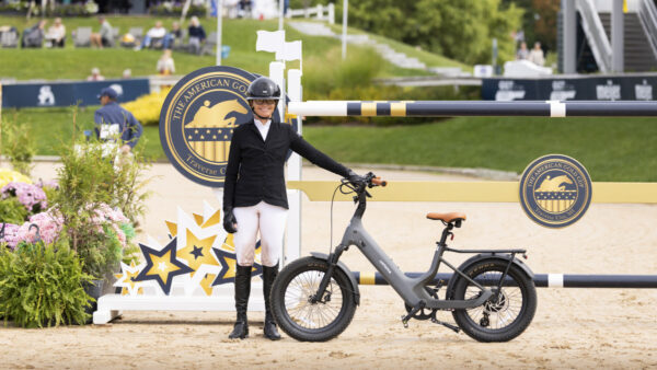 Erynn Ballard receives the Leading Open Jumper Rider Award and Urtopia E-Bike presented by Pedego Traverse City. Photo by Megan Giese Media TCHS
