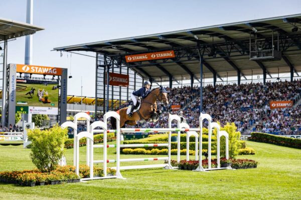 Lillie Keenan and her stallion Kick on